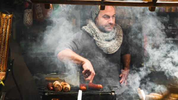 man grilled a hotdog